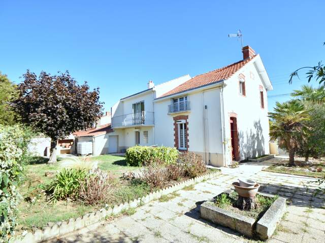 Maison 135 m² - 4 chambres - 44 m² de garages - terrain 390 m² VALLET (44) — photo du bien