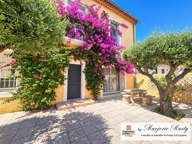 Maison de caractère de 169 m2 avec piscine, garage et jardin arboré de 854 M2 — photo du bien