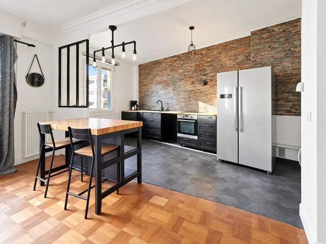 Appartement de 105m2 à Courbevoie Bécon - Balcon, box et cave — photo du bien