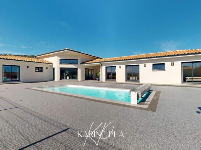 VILLA DE PLAIN-PIED 195 M² AVEC PISCINE, GARAGE ET TERRAIN DE 2 100 M² À CAMPLONG-D'AUDE — photo du bien