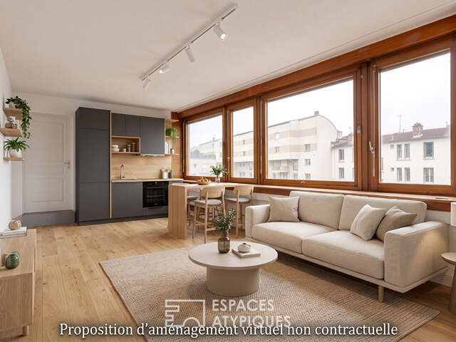 Appartement en plateau à aménagé en dernier étage avec place de stationnement — photo du bien