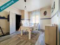IMMEUBLE DE RAPPORT  4 APPARTEMENTS, LOCAL COMMERCIAL, 2 GARAGES ET TERRAIN CONSTRUCTIBLE — photo 2