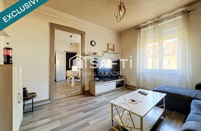 IMMEUBLE DE RAPPORT  4 APPARTEMENTS, LOCAL COMMERCIAL, 2 GARAGES ET TERRAIN CONSTRUCTIBLE — photo 4