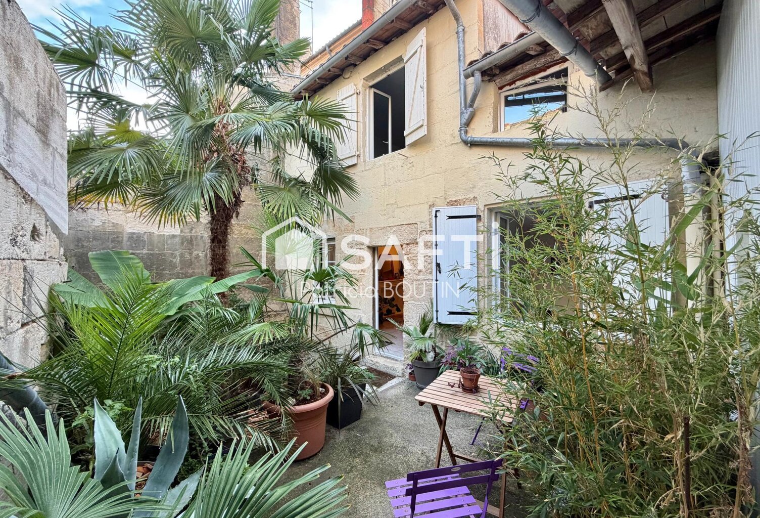 IMMEUBLE DE 5 LOGEMENTS + UNE COUR DANS LE CENTRE VILLE DE NIORT — photo 1
