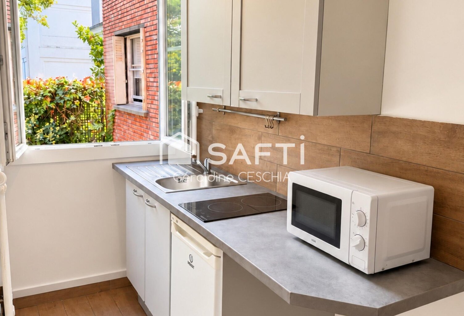 UNE ADRESSE PRIVILÉGIÉE POUR UN PIED-À-TERRE AUX PORTES DE PARIS — photo 1