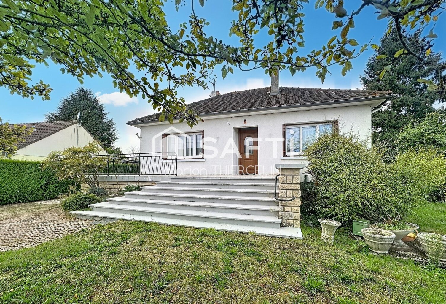 Charmante maison de plain-pied avec localisation idéale et sous-sol total — photo 1
