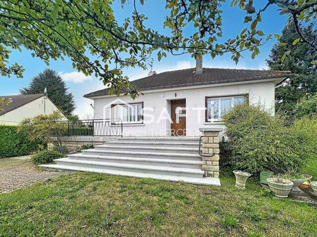 Charmante maison de plain-pied avec localisation idéale et sous-sol total — photo du bien