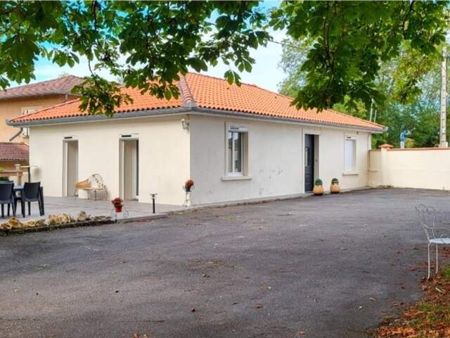 ​Maison de plain-pied 79 m² sur un parc arboré de 3 650 m² avec terrasse – Proche Lac de Sède à Saint-Gaudens — photo du bien