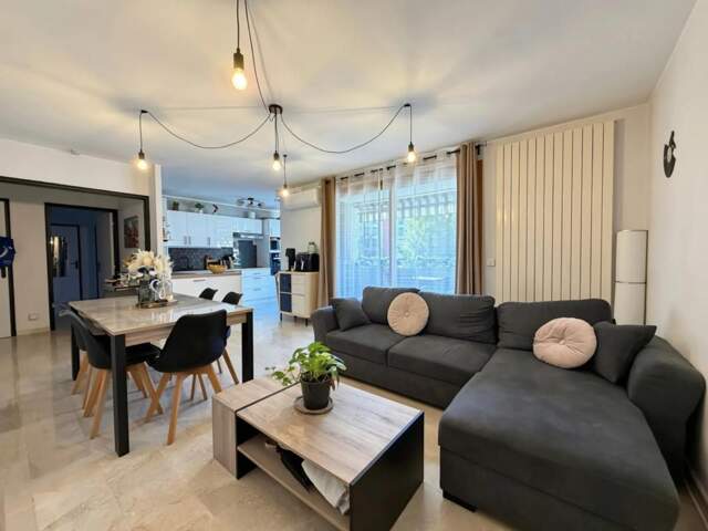 VILLEURBANNE –T3 DE 64 M² – BALCON – GARAGE – CAVE – DOMOTIQUE — photo du bien