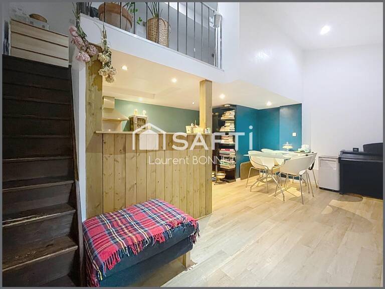 DUPLEX ATYPIQUE AU DERNIER ÉTAGE AVEC TERRASSE — photo 1