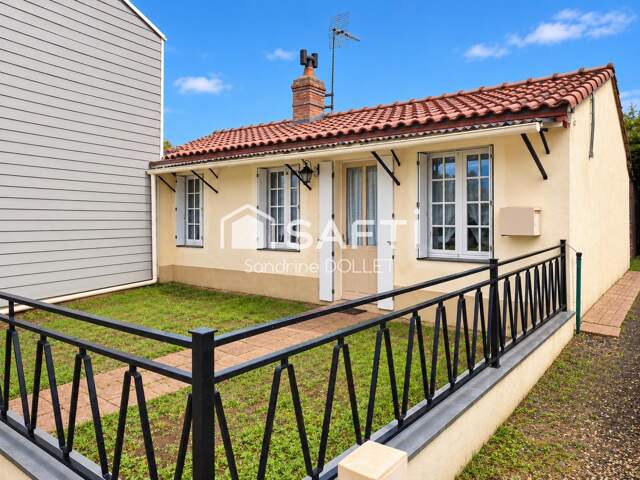 maison avec jardin,3 garages et terrain constructible — photo du bien