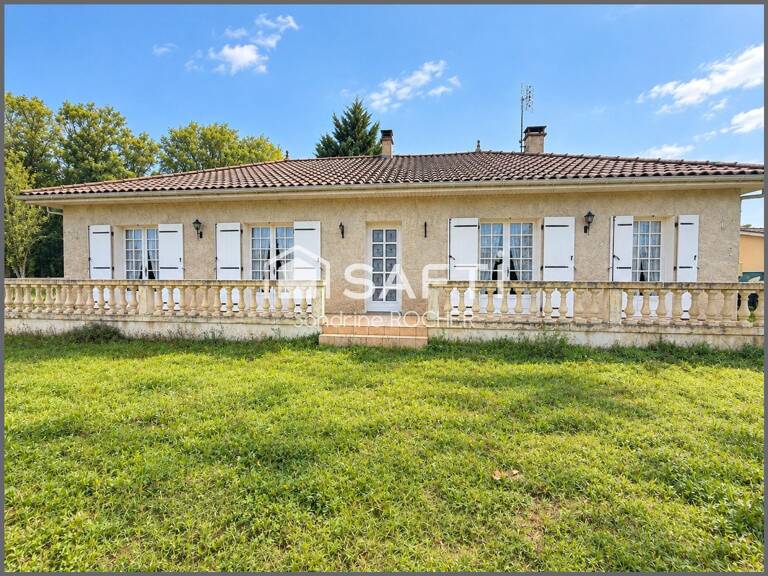 Maison de plain-pied avec terrain arboré et dépendance — photo 1