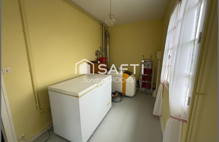 Maison de plain-pied avec terrain arboré et dépendance — photo 3