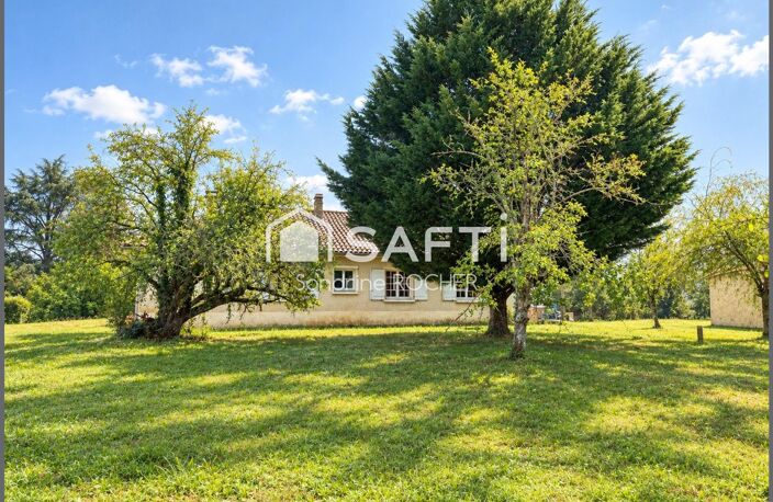 Maison de plain-pied avec terrain arboré et dépendance — photo 4