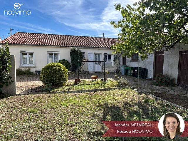 Bourg - Plain-pied 3 chambres avec garage et dépendances — photo du bien