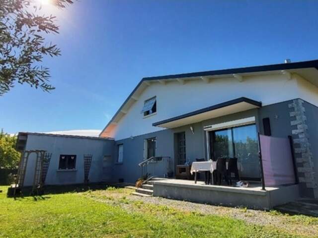 MONTRÉJEAU (31210) – Maison Rénovée  1974 avec 5 chambres, terrain de 719 m², chauffage multi-énergies — photo du bien