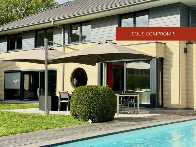 PROPRIÉTÉ D’ARCHITECTE AVEC PISCINE ET JARDIN PAYSAGER – UN BIEN — photo 1