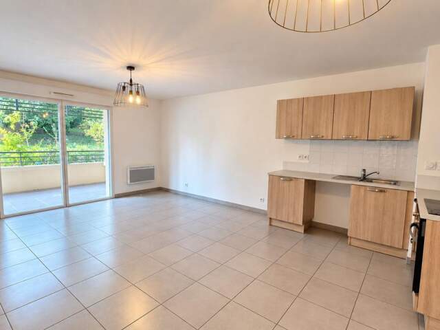 Appartement À Vendre 3 pièces, 62 m², Terrasse, Garage et Parking, Ascenseur — photo du bien
