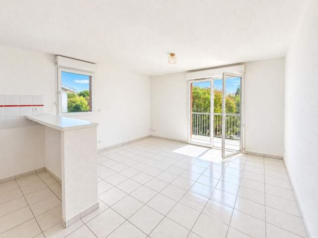 Appartement À Vendre T3 AVEC BALCON ET PARKING À CUGNAUX — photo du bien