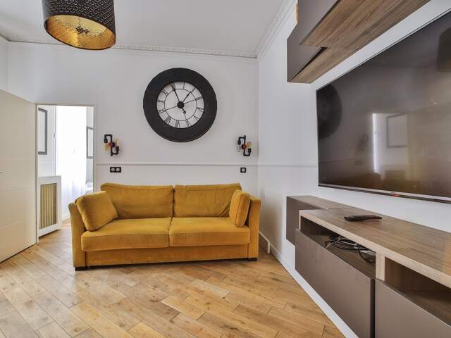 A vendre - Exclusivité - Passy/La Muette - Appartement traversant - Charmant 2 pièces - RDC sur cour - Parfaitement agencé — photo du bien