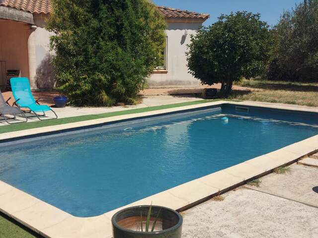 GARD. 30. GENERAC. Belle maison de 184 m2 de plain-pied sur terrain arboré de 1264 m² avec piscine — photo du bien
