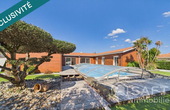 Magnifique maison de plain-pied avec 5 chambres et piscine couverte — photo 2