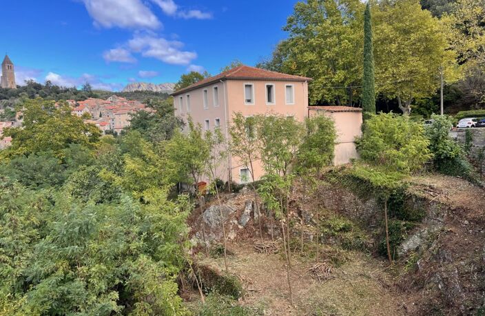Immeuble avec terrain et terrasses — photo 2