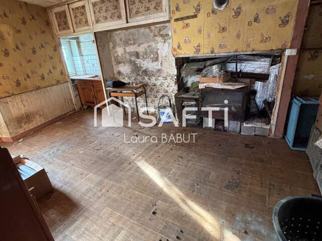 Maison familiale à rénover en bordure de canal — photo du bien