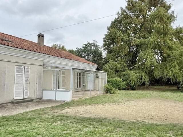 Grand Terrain avec maison / Projet investisseur — photo du bien