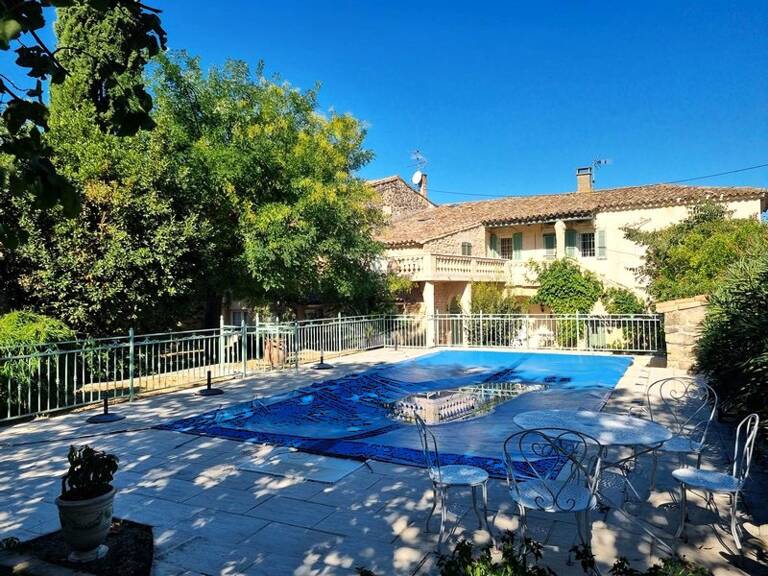Vente maison en pierres apparentes avec piscine et dépendance à SOUVIGNARGUES. 30250. — photo 1