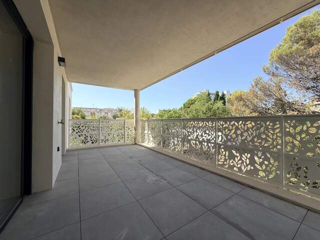 Nîmes, quartier Jean Jaurès, appartement, 65m2, 2chs, terrasse 17m2, ascenseur, parking — photo du bien