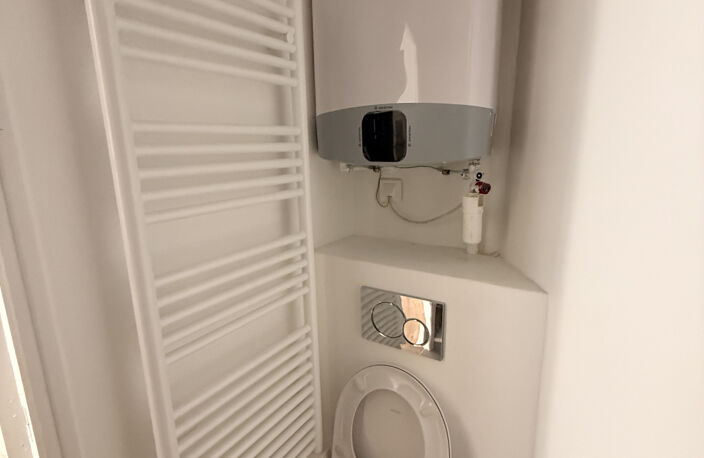 07 - VALS LES BAINS - APPARTEMENT T3 DANS IMMEUBLE RENOVE — photo 5