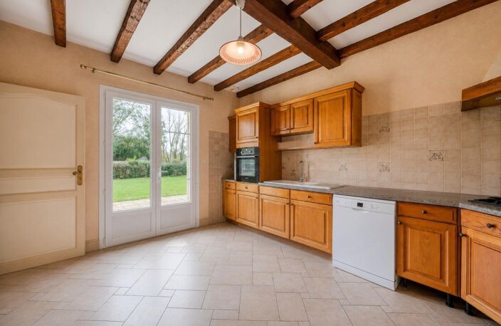 33450 MONTUSSAN - Maison de plain-pied sur parcelle arborée de plus de 1600 m² — photo 4