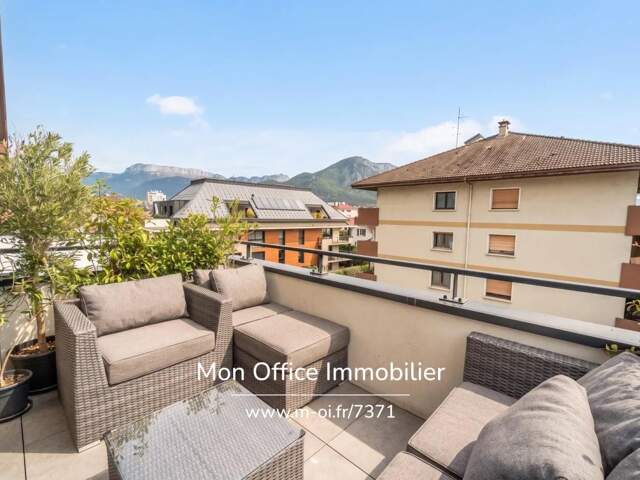 Référence : 7371-TCA - Appartement 4 pièces de 85m2 avec terrasse vue montagne et garage double rue Louis Boch (Annecy centre-ville) — photo du bien