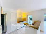 Référence : 7262-LES. - APPARTEMENT T3 AVEC GARAGE ET GRAND JARDIN AU CENTRE DU VILLAGE DE COGOLIN — photo 4