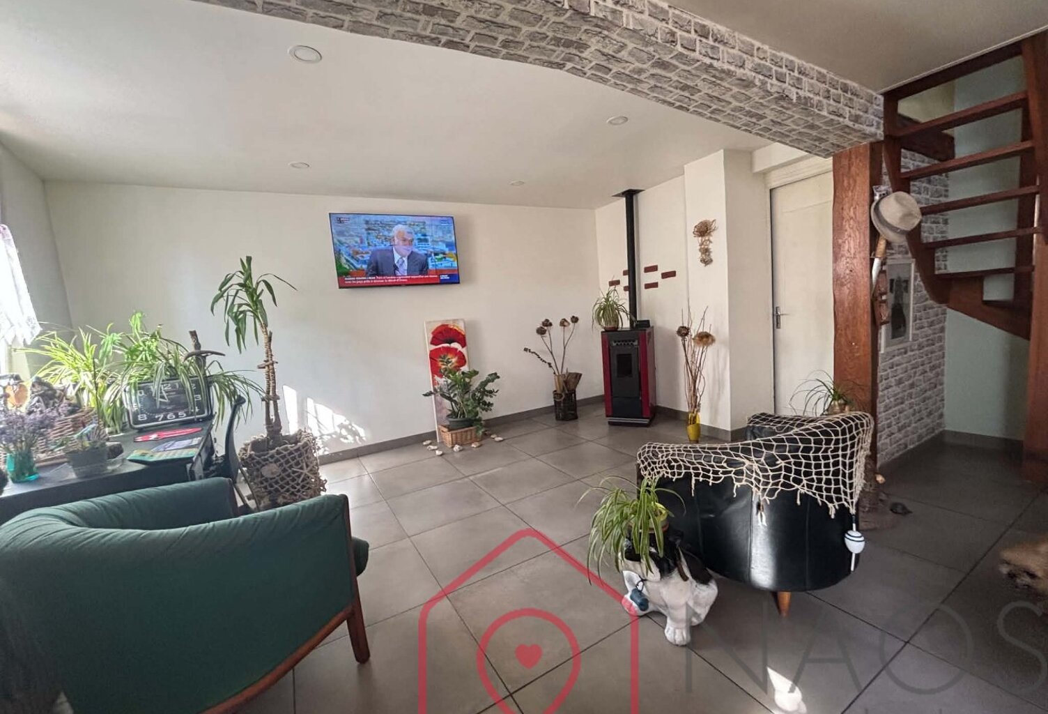 Au cur de la ville, cette maison de 67,31 m², — photo 1