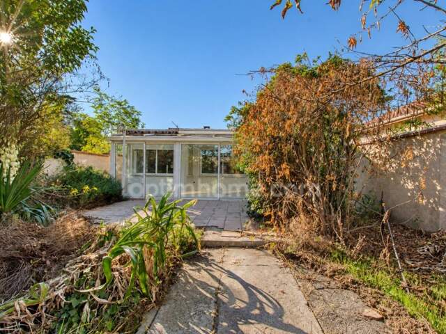 TOULOUSE PURPAN / BALUFFET — MAISON DE PLAIN-PIED, JARDIN, VÉRANDA ET ATELIER INDÉPENDANT 235 000 € — photo du bien