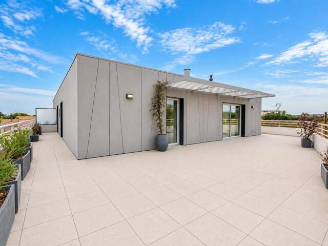 Appartement 4 pièces de 105 m² à Baillargues — photo du bien
