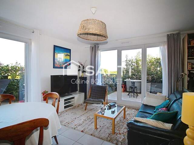 Appartement P3 de 69 m2 avec terrasses et garage — photo du bien