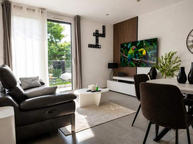 Appartement T3 de 60 m² avec terrasse et garage — photo du bien