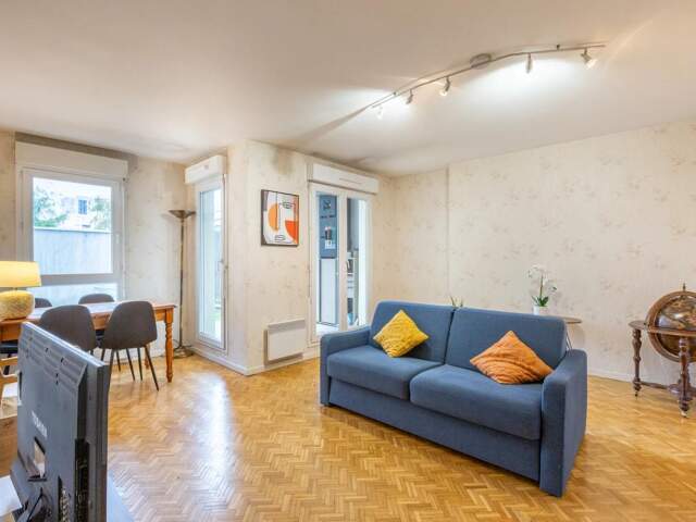 APPARTEMENT 2 PIÈCES – 54 M² – JARDIN DE 50 M² — photo du bien