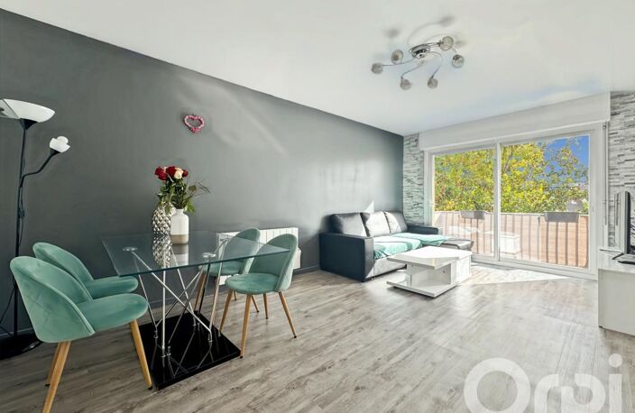 APPARTEMENT 3 PIÈCES DE 65 m² AVEC BALCON, TERRASSE, BOX ET CAVE — photo 2
