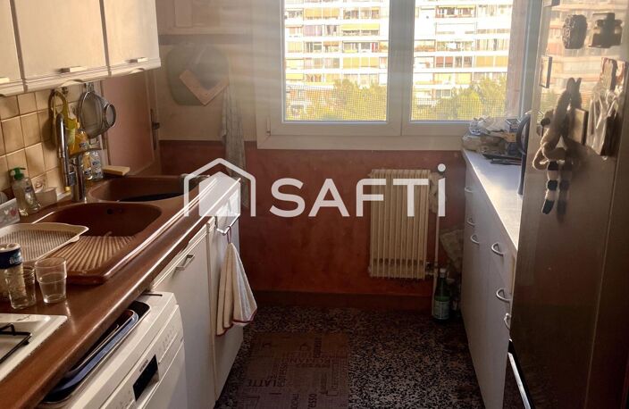 T4/5 ETAGE ELEVE AVEC CAVE ET BOX EN SOUS SOL — photo 4