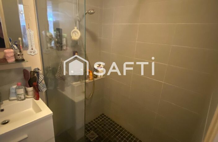 T4/5 ETAGE ELEVE AVEC CAVE ET BOX EN SOUS SOL — photo 5