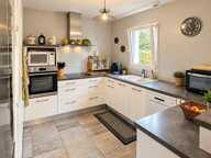 Maison de plain-pied  3 chambres  Garage  Terrain de 795 m² — photo 3