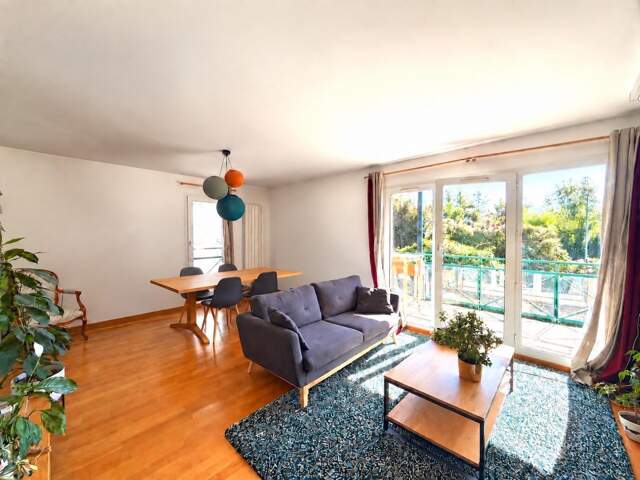 Appartement T4 de 83m², balcon, garage et cave — photo du bien
