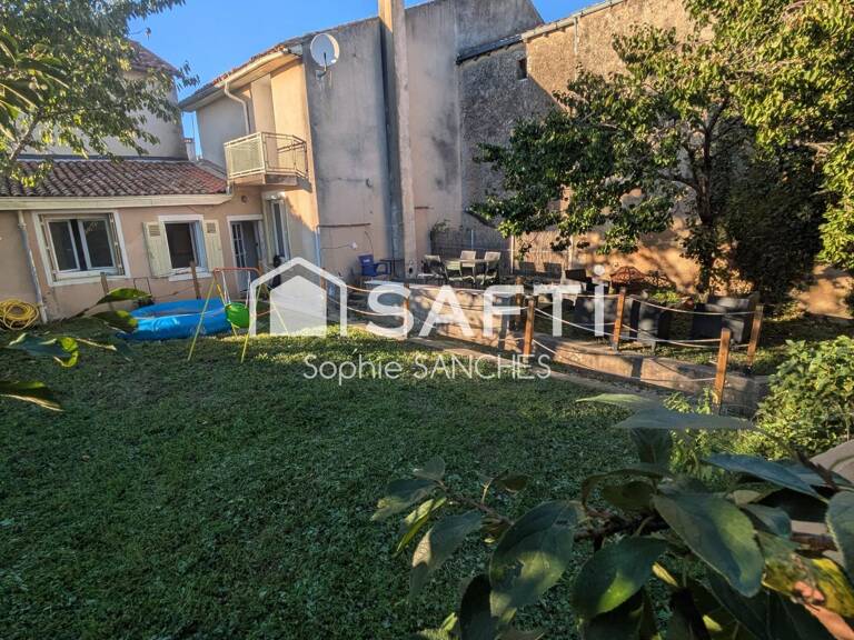 Maison centre bourg avec un jardin — photo 1