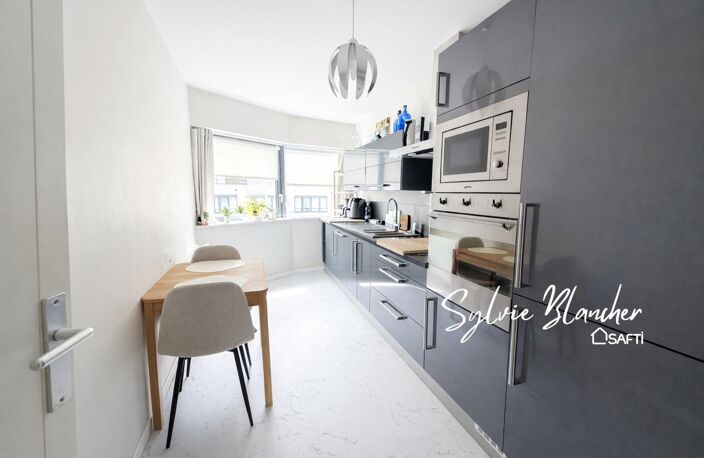 APPARTEMENT 3 PIECES - GARAGE  ET  CAVE — photo 2