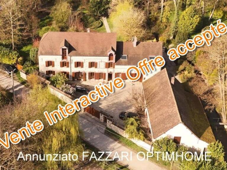 Au cœur d’un domaine clos de 1,5 hectare, ce moulin rénové offre un cadre unique entre étang, rivière et nature préservée — photo 1