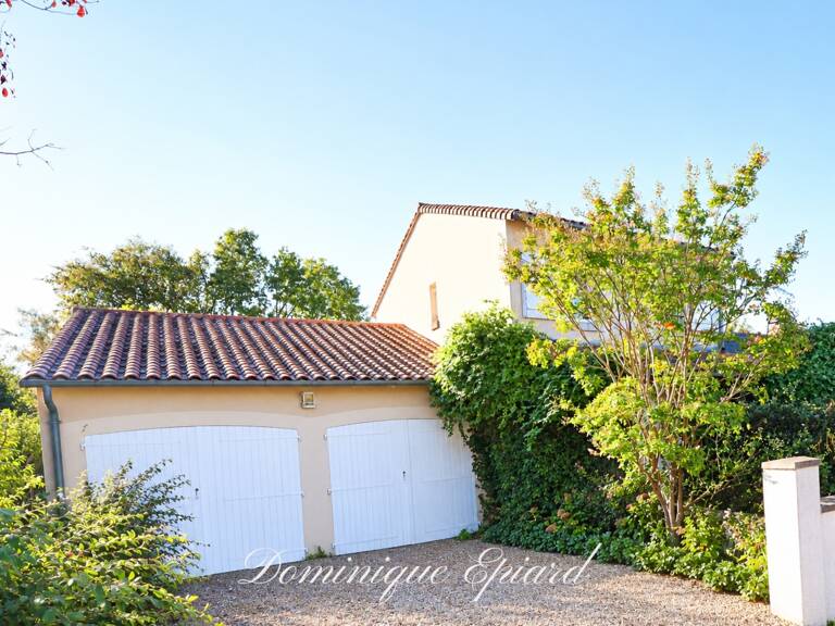 NOUAILLÉ-MAUPERTUIS – Commerces à pied – construction brique MONOMUR 133m2 – 4 CHAMBRES – DPE C – DOUBLE GARAGE — photo 1